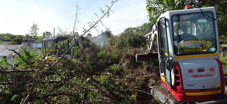 Diggers clearing a site in Cheshire