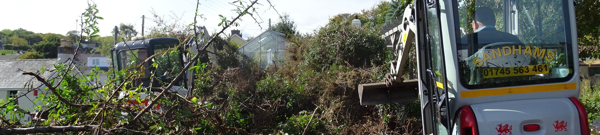 Diggers clearing a site in Cheshire