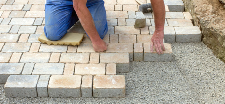 Laying paving stones on driveway in North Wales