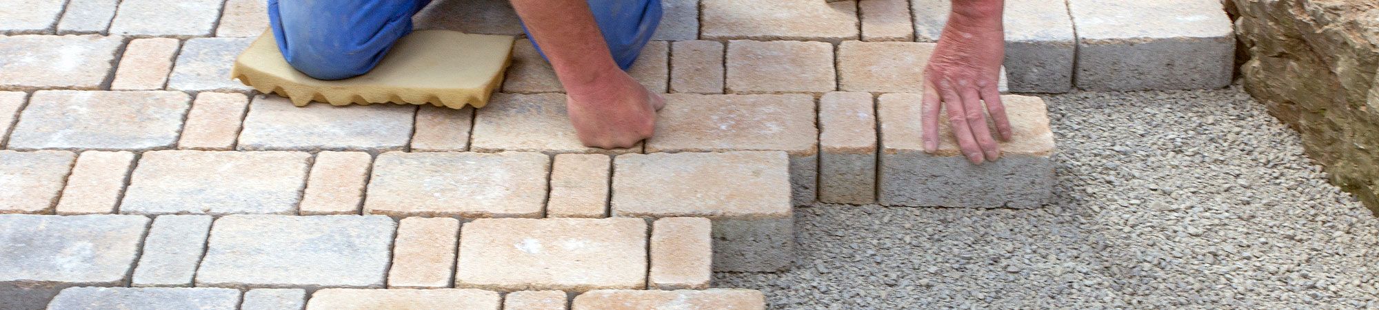 Laying paving stones on driveway in North Wales